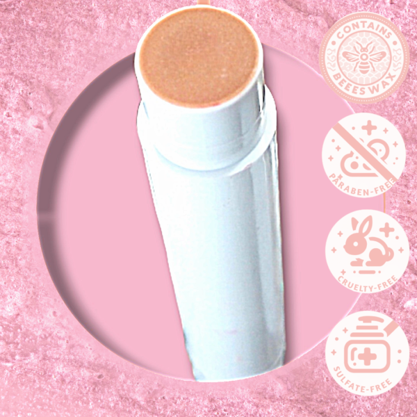 Alt text: A promotional image showcasing a cosmetic product in a plain white tube, possibly a blush or highlighter stick with a peach-toned top. The product is set against a soft pink, glittery background, encircled by a pink circular outline. The image also features three icons indicating the product attributes: "Contains Beeswax" with a bee and honeycomb design, "Paraben-Free" with a prohibition sign over a bottle, "Cruelty-Free" with a rabbit, and "Sulfate-Free" with a crossed-out shampoo bottle, all in a matching soft pink color scheme.
